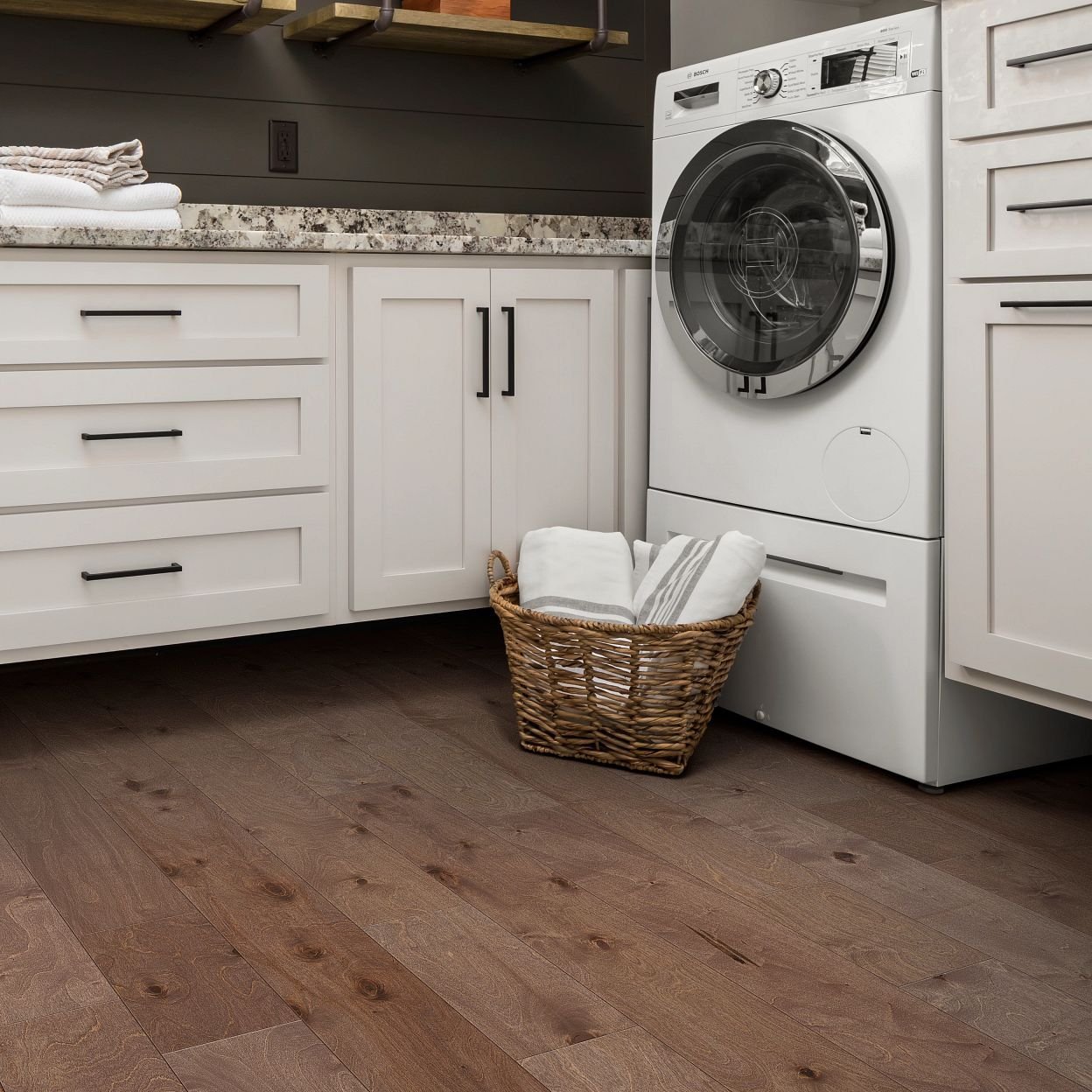 washing machine in bathroom with hardwood flooring Cathedral City, CA area by Canyon Floor Corporation / Canyon Floors